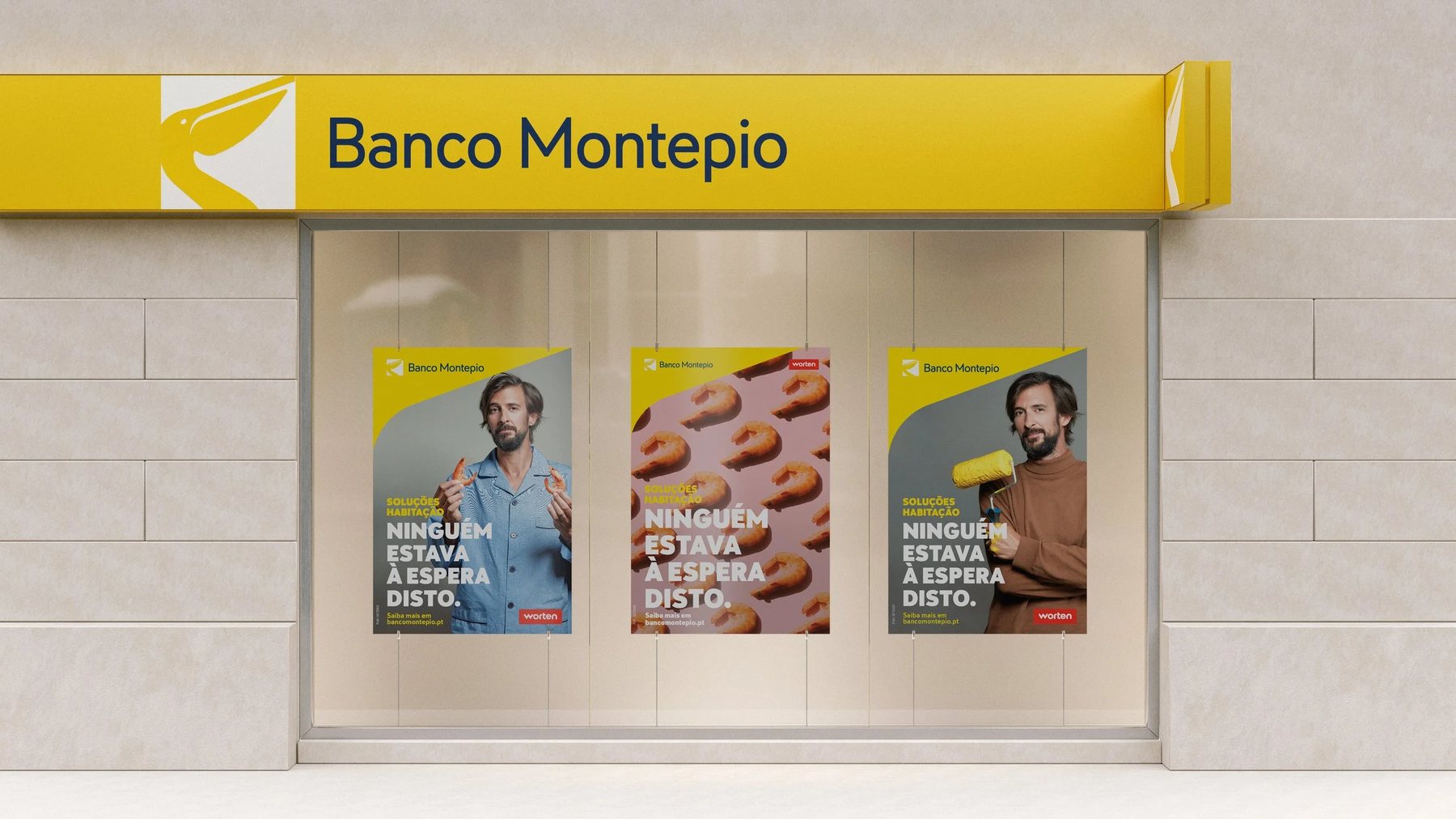 Banco Montepio branch façade with the new yellow sign and campaign posters