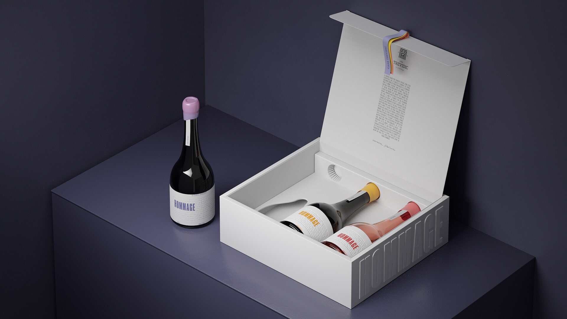 The open Hommage gift box with the three wines